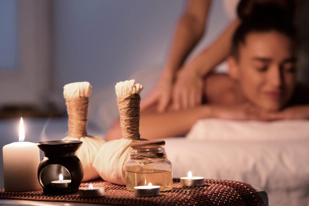 Thai massage. Woman receiving back massage in spa